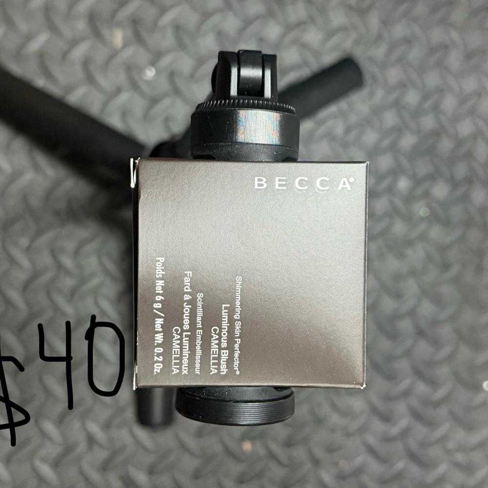 BECCA Shimmering Skin Perfector in Black and Silver